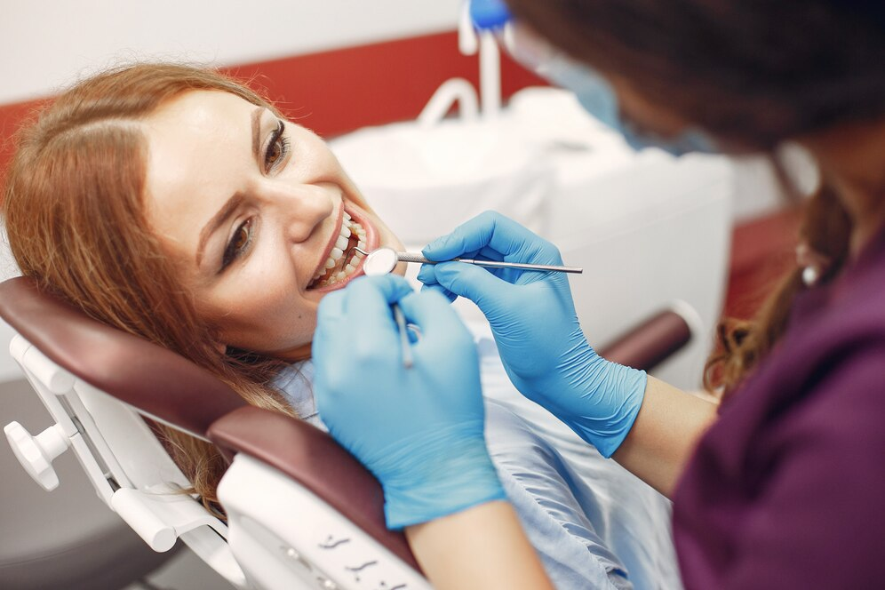 A girk taking a dental treatment