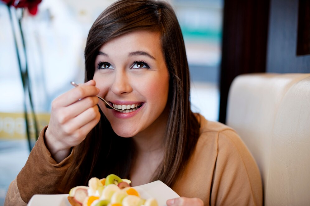 A girl eating delicious food